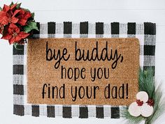 a door mat that says, bye buddy hope you find your dad