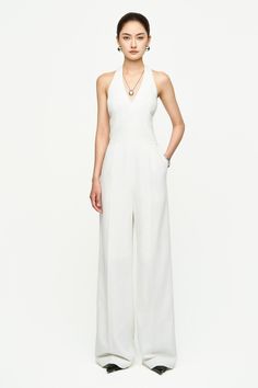 This jumpsuit is crafted from high-quality twill fabric, ensuring durability and comfort. The halter neckline and side pockets provide practicality, while the floor-length design adds elegance. Perfect for both casual and formal occasions, this jumpsuit offers versatility and effortless style. Length:- Top body: 40cm/41cm/42cm (S/M/L)- Low body: 104cm/105cm/106cm (S/M/L) Elegant Strapless Halter Neck Jumpsuit For Spring, Elegant Halter Neck Strapless Jumpsuit For Spring, Elegant Halter Neck Jumpsuits And Rompers For Formal Occasions, Elegant Formal Halter Neck Jumpsuits And Rompers, Elegant Formal Halter Neck Jumpsuits, Summer Workwear Halter Neck Jumpsuits And Rompers, Formal Halter Neck Jumpsuits And Rompers For Summer, Summer Workwear Halter Neck Jumpsuit, Formal Halter Neck Jumpsuit For Summer