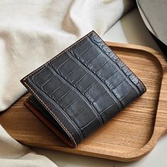 Men's leather Alligator bifold wallet  Thank you for your trust in ordering from us. We appreciate your expressions of appreciation and are especially grateful for the recent wallet order. Hope that our products will bring good luck to you. Thank you for choosing our store to supply your needs. We look forward to sharing your success. 1) Product Description: Dimensions: approx. 110mm x 95mm Color: Dark Grey Material: Outer - Alligator Leather Interior - Alligator Leather Made in Vietnam. 2) Shipping and handling: - We will send through the shipping unit of the shipping enterprises in Vietnam. - After receiving your order, we will take 5 to 7 days to process the product and then ship it to you. - It will take 10-20 days to arrive - Contact us if you need a faster delivery service - Orders p Gifts For Him Birthday, Birthday Gifts For Men, Engraved Wallet, Valentine's Gifts, Mens Wallet, Personalized Wallet, Good Luck To You, Bring Good Luck, Wallet Gifts