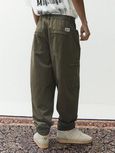 This is a casual and comfortable balloon pants that is made out of sturdy cotton 100% fabric. With soft touch of the fabric, elastic waistband, and hidden pocket, it can be easily styled for your daily outfit.- Washed cotton twill fabric for soft touch- Elastic waistband- Hidden pocket detail Baggy Cargo Style Cotton Pants, Cotton Utility Parachute Pants With Elastic Waistband, Solid Cotton Parachute Pants With Multiple Pockets, Cotton Parachute Pants With Multiple Pockets, Khaki Cotton Parachute Pants With Multiple Pockets, Casual Cotton Parachute Pants With Multiple Pockets, Utility Cotton Parachute Pants With Elastic Waistband, Khaki Cotton Cargo Style Parachute Pants, Khaki Cotton Cargo Parachute Pants