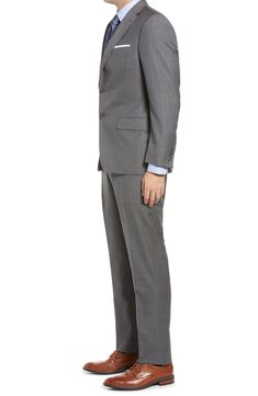 High-quality super 140s Italian wool elevates this handsome suit cut in a classic fit for versatile appeal. 100% wool Dry clean Made in Canada Classic Slim Fit Suit With Notch Lapel, Classic Slim Fit Double Breasted Suit With Notch Lapel, Classic Tailored Double Breasted Suit For Business Casual, Slim Fit Suit With Pressed Crease For Business Casual, Tailored Classic Business Casual Suits, Slim Fit Suits With Pressed Crease For Business Casual, Classic Slim Fit Double Breasted Suit For Work, Classic Business Casual Suit With Notch Lapel, Timeless Tailored Suits For Business Casual