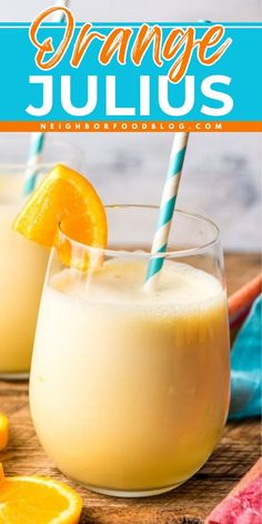 two glasses filled with orange juice on top of a wooden table