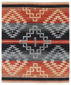 an orange, black and grey rug with geometric designs on the bottom half of it