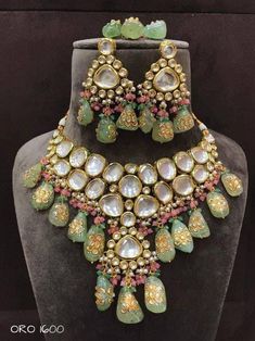 Sabyasachi Inspired Designer Kundan Set, Green Kundan Choker, Kundan Bridal Choker Set, Kundan Bridal Set Sabyasachi inspired kundan choker set with a twist of Tanjore hand-painted beads perfect for brides. Color of the tanjore beads can be custozmied Details: > Premium quality kundans used with back meenakari > Hand-painted tanjore beads in unique irregular shapes > tiny Onyx beads to enhance the beauty > Color of the tanjore & onyx can be customized. Please message us for more info. Feedback: Bridal Choker Set, Wedding Choker Necklace, Kundan Choker Set, Hand Painted Beads, Kundan Jewellery Set, Kundan Choker, Bridal Choker, Irregular Shapes, Wear Necklaces