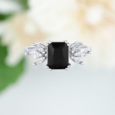 This gorgeous, timeless ring features our favorite black onyx design and hand picked crystals. ✦ DETAILS ✦ ✧ Handcrafted ✧ 2.0 Carat center stone ✧ Black onyx and cz crystals ✧ Sizes 3.75-11.25 ✧ Sterling Silver 925 ✧ This ring will arrive ready to gift in a Kherish Jewelry Pouch. ✧ PRE-ORDER: Items that are preorder only will ship within 10-15 business days. You will receive an email with the updated processing time if you order a size/option that qualifies for pre-order. ✧ Due to the nature of Classic Black Jewelry With Center Stone, Classic Black Rings With Accent Stones, Black Jewelry With Center Stone For Anniversary, Black Jewelry With Prong Setting For Anniversary, Black Cubic Zirconia Rings For Anniversary, Black Oval Diamond Ring In Sterling Silver, Black Cubic Zirconia Anniversary Rings, Oval Black Diamond Ring In Sterling Silver, Classic Black Jewelry With Accent Stones