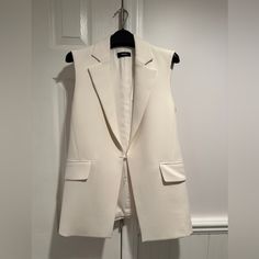 Questions? Leave A Comment Below! White Fitted Sleeveless Blazer, Chic White Vest With Pockets, Tailored Sleeveless Spring Outerwear, Classic White Workwear Vest, Classic White Work Vest, Classic White Sleeveless Outerwear, White Sleeveless Formal Outerwear, Elegant Sleeveless Winter Blazer, Elegant White Vest For Fall