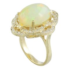 Stamped: 14K Total Ring Weight: 7 Grams Opal Weight 6.55 Carat (16.00x12.00 Millimeters)Diamond Weight: 0.50 carat (F-G Color, VS2-SI1 Clarity )Face Measures: 25.40x21.55 Millimeter SKU: [600744] Exquisite Yellow Gold Opal Gemstone Ring, Luxury Yellow Gold Opal Ring Collectible, Luxury Gold Opal Ring Hallmarked, Victorian Opal Jewelry In Yellow Gold, Luxury Vintage Multi-stone Opal Ring, Yellow Gold Diamond Ring, Gold Diamond Rings, Precious Metals, Gold Diamond