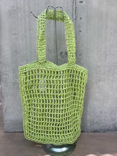 The perfect beach or market bag for this summer. Features an open weave design. Its a laid back, relaxed style but roomy enough to fit all your essentials Colors: green, hot pink Open Weave Green Crochet Bag For Beach Shopping, Trendy Green Beach Bag With Braided Handles, Summer Green Bags With Braided Handles, Green Crochet Bag For Beach Season Shopping, Green Bohemian Crochet Shopping Bag, Bohemian Green Crochet Shopping Bag, Green Rectangular Shoulder Bag For Summer, Trendy Open Weave Crochet Tote Bag, Green Vacation Bags With Braided Handles