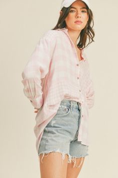 The oversized button-up shirt effortlessly blends comfort and fashion-forward style. With its loose and relaxed fit, it offers a laid-back yet chic vibe that can be easily dressed up or down. Whether paired with leggings for a cozy day in or knotted at the waist over shorts for a trendy look, the oversized button-up shirt is a versatile addition to any casual wardrobe.Size + Fit (inch):S: 23.0 (Bust), 30.5 (Length)M: 23.5 (Bust), 31.0 (Length)L: 24.0 (Bust), 31.5 (Length)