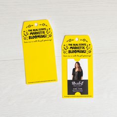 two yellow tags with black and white writing on them, one has a photo of a woman