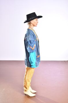 "Handmade SouthWest Denim Jacket/ HandPainted Pueblo Pottery/ Southwest Denim Coat/ Size M Puff shoulder with aqua sweatshirt sleeve and lining! This jacket is more than fun, someone put the love of culture into it. No tag, artist remains a mystery! Made out of Wrangler jeans, Wrangler tag on one of the pockets! Instantly turn a grey day alive with the sun and sky of the southwest, by simply wearing this jacket! I just love the aqua blue, the water, sacred especially in the desert! Measurements: Pre-washed Long Sleeve Denim Jacket For Fall, Vintage Patchwork Denim Jacket For Festivals, Vintage Long Sleeve Denim Top For Fall, Retro Blue Denim Vest For Fall, Denim Blue Jacket For Fall Festival, Blue Pre-washed Denim Jacket For Fall, Fall Blue Pre-washed Denim Jacket, Blue Long Sleeve Denim Jacket For Festival, Blue Cotton Hippie Denim Jacket