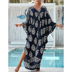 Navy Blue Print Long Kinimo Beachwear Chic Blue Beach Dress For Poolside, Blue Flowy Cover-up For Beach Season, Blue Printed V-neck Cover-up, Relaxed Fit V-neck Beach Dress For Vacation, Blue Beach Dress For Poolside Spring, Chic Blue V-neck Cover-up, Relaxed Fit V-neck Cover-up For Vacation, Casual Blue V-neck Beach Dress, Blue Long Sleeve Beach Dress For Beach Party