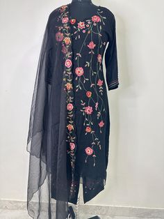 Salwar Kameez Set/Dresses For Women/Indian Wedding Dress/Pakistani Suit/ Kurta Palazzo Set / Kurtis for Women/ Gift for Women / Anarkali Style Kurta Set Product Details Black embroidered Kurta with Trousers with dupatta Kurta design:  * Floral embroidered * A-line shape * Regular style Round neck, three-quarter regular sleeves . Thread work detail * Calf length length with scalloped hem * Pure cotton fabric Trousers design:  * Embroidered Trousers * Elasticated waistband * Slip-on closure Materi Diwali Chanderi Churidar With Floral Embroidery, Diwali Churidar With Floral Embroidery In Chanderi, Diwali Floral Embroidered Chanderi Churidar, Traditional Salwar Kameez With Floral Embroidery For Diwali, Floral Embroidered Chanderi Churidar For Navratri, Traditional Semi-stitched Churidar With Floral Embroidery, Straight Kurta Salwar Kameez With Floral Embroidery, Traditional Churidar With Floral Embroidery For Navratri, Festival Chanderi Salwar Kameez With Floral Embroidery