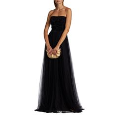 New Size 2 $1190 Details Chiara Boni La Petite Robe's Brielle Mesh Gown Features A Strapless Neck, Tonal Velvet Flowers On The Bodice, And A Full Skirt. Strapless Zip Center Back 45% Polyester/35% Nylon/20% Elastane Dry Clean Only Made In Italy Size & Fit Fitted About 63.77" From Shoulder To Hem Gala Tulle Evening Dress, Floor-length Strapless Dress For Evening, Evening Floor-length Strapless Dress, Elegant Strapless Tulle Dress For Wedding, Chic Tulle Evening Gown, Chic Tulle Gown For Evening, Evening Strapless Tulle Dress With Sweetheart Neckline, Strapless Evening Wedding Gown, Chic Strapless Tulle Dress For Wedding