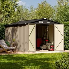 a garden shed with its doors open and lawn chairs outside