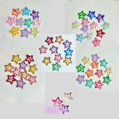 several different colored stars on a white surface