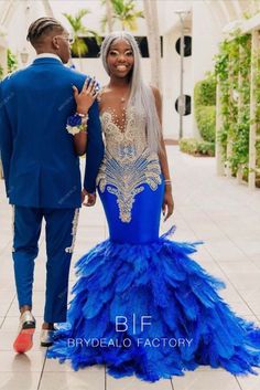 Sparkly Rhinestones Royal Blue Big Feather Trumpet Long Prom Dress Inspiration Image. Sleeveless long formal dress features illusion jewel neck front top beautifully adorned with dazzling beadwork, back top fully covered by blue satin, court train puffy bottom with cascading large sized feathers. #prominspiration #2024 Glitter Prom Dresses, Prom Photoshoot, Prom Inspiration, Prom Couples, Sparkly Prom Dress, Special Occasion Gowns, Gorgeous Prom Dresses, Royal Blue Prom Dresses, Trumpet Dress