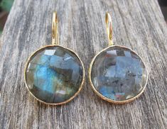 A bohemian festive pair of gold plated sterling silver Dangle Earrings in round-shaped faceted Labradorite. Wrapped in a box ready for gift giving. (E-6) Stone measure 20mm *LIKE* us on Facebook http://www.facebook.com/Belesas to find special coupon codes, *FOLLOW* us on Twitter https://twitter.com/#!/Belesas to get more exclusive coupon codes *All item are ready to ship! Free shipping on orders over $150 using coupon code BELESAS150 ---------------------------------------------------- ENTER MY Bohemian Yellow Gold Round Earrings, Bohemian Gold Faceted Earrings, Silver Gold Earrings, Earrings Stone, Coupon Ideas, Earrings Gemstone, Labradorite Earrings, Earrings Round, Sterling Silver Dangle Earrings