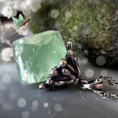 This beautiful mini Fluorite Crystal Pendant is made of sterling silver and green fluorite. Untreated crystal! Stone: 1.18 x 0.94 x 0.79 in (30 x 24 x 20 mm) natural green fluorite crystal Sterling silver (Ag 925) Length of the pendant is 1.77 in (45 mm) The pendant comes without a chain. Please, note that the price for this item includes "Free shipping".  The FREE delivery option is UNINSURED Standard International with a tracking number.  However, some countries do not support tracking service Green Fluorite, Fluorite Crystal, Green Stone, Crystal Pendant, Sterling Silver, Crystals, Music Clothes, Stone, Pendant