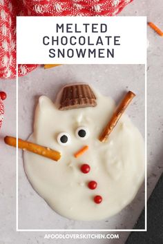 melted chocolate snowman with carrots and candy sticks in the shape of a snowman