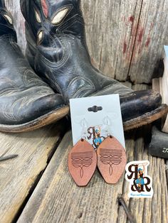 Let your inner cowgirl shine! These Desert Cowgirl Earrings will add a little bit o' western flair to any outfit. Lightweight and made of acrylic, they'll keep your ears feeling comfortable and looking stylish! 1.25” Country Concert Earrings, Cowgirl Earrings Western, Country Earrings Cowgirl, Cowgirl Hat Earrings Pink, Cowgirl Bling Jewelry, Leather Boots, Boots, Leather