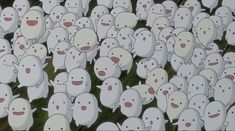 a large group of little white ghost like creatures