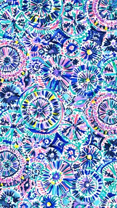 an abstract blue and pink background with many circular designs on the surface, all in different colors