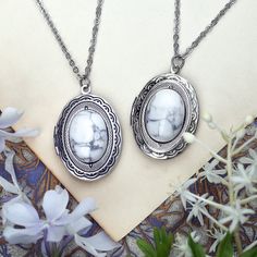 Stone Oval Locket Necklaces in Onyx, Black and Gray Snowflake Obsidian or White Howlite - Etsy Antique Silver Necklaces With Oval Vintage Charm, Antique Silver Necklace With Vintage Charm, Antique Silver Oval Necklace With Vintage Charm, Silver Oval Vintage Style Necklace, Antique Silver Necklace With Vintage Charm In Oval Shape, Silver Oval Locket Necklace For Vintage Collection, Oval Silver Locket Necklace For Vintage Collection, Antique Silver Nickel Free Oval Necklace, Antique Silver Oval Nickel-free Necklace