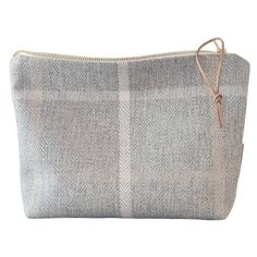 CANADA : TAXE INCLUDED  CANADA : TAXE INCLUSES   Enjoy this very unique makeup bag! This neutral cosmetic bag will be your favorite minimalist pouch to carry your little needs: lip balm, beauty products, nails, hair accessories, intimate products etc... you will love it. It's carefully made in a designer fabric called Olefin, resistant upholstery type fabric. perfect gift for women... .  This is:  Greyline . Fabric:  FRONT : OLEFIN                   BACK:  solid organic cotton canva . Natural co Gray Pouch Bag For Gift, Gray Pouch Bag As Gift, Beige Zipper Pouch Cosmetic Bag, Gray Pouch Bag With Zipper, Gray Zipper Pouch Bag, Gray Everyday Bag With Zipper Pouch, Rustic Makeup, Toiletry Bag Women, Bag Minimalist