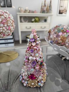 a christmas tree made out of pearls and other jewels