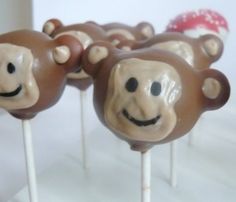 there are many monkey lollipops with faces on them