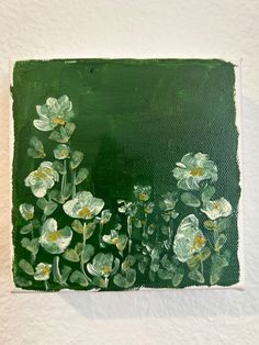 a painting of white flowers on a green background