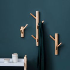 the coat rack is made out of wood