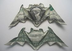 two origami bats made out of one dollar bill