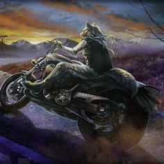 a man riding on the back of a motorcycle in front of a sky filled with clouds