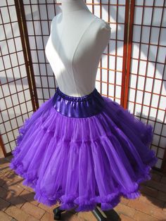 "This listing is for a custom order for a super-full double layer nylon organdy petticoat with satin waist and chiffon bottom ruffles. The pictured petticoat was designed for a 30\" (76cm) waist, 38\" (96,5cm) hips and is 23\" (58,5cm) long. It is displayed on a dress form with a 22\" (55cm) waist. You can choose any length you need. I will lengthen each of the tiers to achieve extra length. If you would prefer that I add another tier to achieve extra length, then the price will increase substan Party Organza Petticoat With Ruffles, Organza Petticoat With Ruffles For Parties, Stretch Tulle Petticoat With Attached Cancan, Ruffled Tulle Petticoat For Costume Party, Tulle Ruffled Petticoat For Costume Party, Tulle Petticoat With Ruffled Skirt For Costume Party, Elegant Organza Petticoat With Tulle Skirt, Stretch Tulle Petticoat With Ruffled Skirt, Party Petticoat With Ruffles In Crinoline