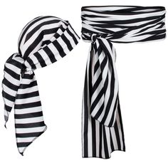 a black and white striped scarf tied to a headband