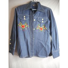 Vintage 60s 70s Floral Embroidered Shirt blue Denim by Blanquita - from an Estate apparently this brand was very popular at high end resorts - made in Mexico multicolored floral embroidered on front and back faux pocket flaps has cufflinks in the cuffs, not sure if they go with this or not, but since they came with it, I'm sending them along... they look like the old chrysler car logo Sz M / 36 no material tag but it has a lightweight denim feel to it, it could be a cotton blend, or some of the older polyester has a similar feel probably from the last 60's or 70's based on label cool vintage white buttons because of the age, I would hand wash this Approximate measurements: laying flat; 25 inches from center back to bottom of shirt waist; 18 inches from armpit to armpit this could be worn a Fitted Embroidered Medium Wash Tops, Retro Medium Wash Tops For Spring, Retro Floral Embroidered Button-up Top, 1970s Button-up Spring Top, 1970s Style Button-up Spring Top, 1970s Style Button-up Top For Spring, Retro Long Sleeve Top With Floral Embroidery, 1970s Button-up Tops For Spring, Retro Long Sleeve Denim Top