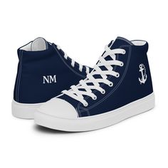 WOMEN'S NAVY BLUE HIGH-TOP CANVAS SNEAKERS WITH CUSTOM INITIAL/TEXT ON ONE SHOE, WHITE ANCHOR ON ANOTHER SHOE. Please check the sizing chart between the listing photos. Don't forget to treat your feet with care! The classic, stylish high top canvas shoes will be a great addition to your wardrobe. * 100% polyester canvas upper side * Ethylene-vinyl acetate (EVA) rubber outsole * Breathable lining, soft insole * Faux leather toe cap * Padded collar, lace-up front * Blank product sourced from China Important: This product is available in the following countries: United States, Canada, Australia, United Kingdom, New Zealand, Japan, Austria, Andorra, Belgium, Bulgaria, Croatia, Czech Republic, Denmark, Estonia, Finland, France, Germany, Greece, Holy See (Vatican city), Hungary, Iceland, Ireland High-top Sneakers With Letter Print And White Sole, White Sole High-top Sneakers With Letter Print, Navy Casual Custom Sneakers With Rubber Sole, Casual Navy High-top Sneakers With Rubber Sole, Navy Lace-up Casual Custom Sneakers, Navy Casual Custom Sneakers With Round Toe, Navy Casual High-top Custom Sneakers, Casual Navy Low-top Custom Sneakers, Navy Canvas Shoes For Streetwear