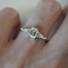 White Gold Antique Engagement Rings, Fairytale Inspired Engagement Rings, Two Toned Rings Engagement, Unique Pear Engagement Ring Vintage, Simple Gold Wedding Bands, Emerald Cut Unique Engagement Ring, Engagement Ring With Emerald Accents, Unique Gold Engagement Ring, Vintage Emerald Cut Engagement Rings