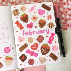 an open notebook with the word february written in pink and chocolate covered treats on it