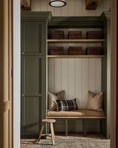 a room with some shelves and a bench