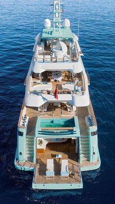 a large white boat floating on top of the ocean