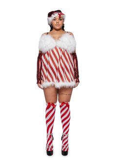 a woman dressed as santa clause with red and white striped stockings