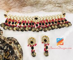 Black Kundan Tumble Moti Choker Necklace Earrings Set - Available to be shipped for FREE from Canada to US, Canada, Australia, New Zealand, Norway, Europe and everywhere else. Explore more BRIDAL SETS, INDIAN JEWELRY SETS 📦 Unmatched FREE Worldwide Shipping ⭐️⭐️⭐️⭐️⭐️ 5 Star Customer Reviews Baljit, USA ⭐️⭐️⭐️⭐️⭐️ My experience with Amazel Designs was perfect the earrings are great. I loved how shipping was quick and they were packed really good. Ramandeep, USA ⭐️⭐️⭐️⭐️⭐️ Thank you Amazel Desig Handmade Black Temple Jewelry, Handmade Black Jewelry For Festivals, Black Temple Jewelry For Ceremonial Occasions, Heavy Black Temple Jewelry, Traditional Black Ceremonial Jewelry, Heavy Black Jewelry For Gift, Handmade Black Jewelry For Wedding, Heavy Black Jewelry Gift, Elegant Heavy Black Jewelry