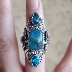 Brand New Handmade Huge Neon Blue Apatite And Faceted Blue Topaz Silver Statement Ring. Size 6.75 - 7 925 Stamped New To Poshmark? Use Referral Code Kimberlyn222 To Receive $10. Spiritual Blue Topaz Jewelry In Blue, Silver Apatite Jewelry For Anniversary, Blue Bohemian Jewelry With Accent Stones, Spiritual Blue Crystal Gemstone Ring, Blue Natural Stone Crystal Ring In Sterling Silver, Blue Sterling Silver Crystal Ring With Natural Stones, Bohemian Blue Crystal Ring In Sterling Silver, Bohemian Blue Crystal Sterling Silver Ring, Spiritual Blue Crystal Ring In Sterling Silver