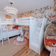 a room with bunk beds, desks and other items in the room on the floor