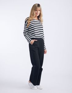 DESCRIPTION Discover the Timeless Straight Leg Ponte Pant, a wardrobe essential from White & Co. that promises comfort and style for any setting. Crafted in classic black, these pants offer a flattering, relaxed fit and showcase a subtle yet chic black tape down the sides. The perfect versatile work-to-weekend piece, they pair beautifully with a crisp white tee and classic blazer for a monochromatic look, or add a pop of colour with a patterned blouse for an effortless transition from day to nig Black Chinos For Work With Straight Hem, Classic Black Chinos For Spring, Black Relaxed Fit Chinos For Fall, Relaxed Fit Black Chinos For Fall, Classic Black Chinos With Straight Hem, Classic Black Straight Chinos, Chic Black Bottoms With Straight Hem, Versatile Black Pants With Straight Hem, Black Chinos For Workwear In Fall