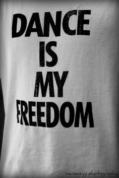 a t - shirt with the words dance is my freedom printed on it in black and white