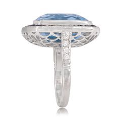 This impressive ring features a 16.35 carat emerald cut aquamarine surrounded by a halo of diamonds. Stunning openwork filigree adorns the under gallery, with accenting diamonds on either shoulder. ✦ DIAMOND SPECIFICATIONS: Diamond Cut: Emerald Cut Diamond Weight 16.35 Carats ✦ ENGAGEMENT RING SPECIFICATIONS: Ring Material: Platinum Stones: Aquamarine, Diamond, Sapphire ✦ WHAT COMES IN YOUR SHIPMENT: - Your Engagement Ring - Quality Ring Box - Jewelry Cleaner - UGL Certificate ✦ WHY SHOP WITH US Gia Certified Octagon Sapphire Luxury Ring, Gia Certified Octagon Sapphire Ring, Luxury Style, Luxury Gia Certified Octagon Sapphire Ring, Luxury Sapphire Baguette Cut Ring, Luxury Octagon Emerald Ring With Prong Setting, Luxury Gia Certified Baguette Cut Sapphire Ring, Luxury Gia Certified Octagon Diamond Ring, Luxury Platinum Octagon Sapphire Ring, Luxury Octagon Sapphire Ring In Platinum